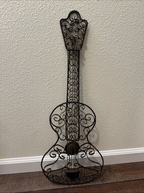 Ornate Metal Guitar Wall Sculpture in Black with distressed Bronze accents